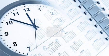 Photo for Clock face and calendar diary page - Royalty Free Image