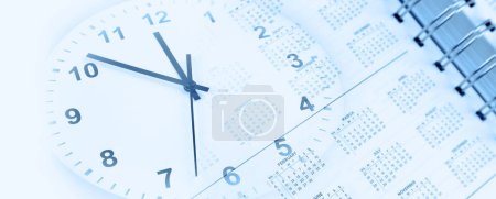 Photo for Clock face and calendar page - Royalty Free Image