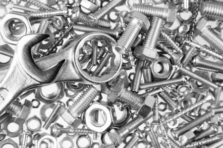 Photo for Wrenches on chrome nuts and bolts - Royalty Free Image