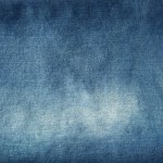 Close-up of blue denim jeans fabric texture backgroun