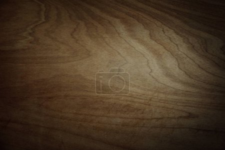 Photo for Close-up of pattern in brown wood background. Dark edges - Royalty Free Image