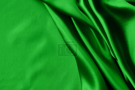 Foto de Tejido de seda de satén verde ondulado - Imagen libre de derechos