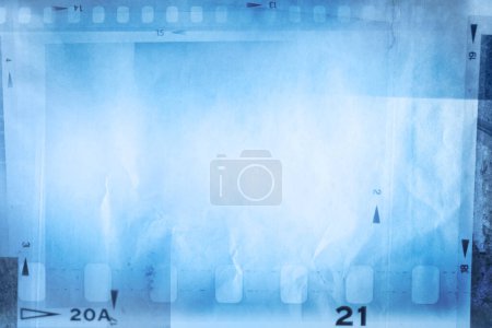 Foto de Película negativos marcos fondo azul - Imagen libre de derechos