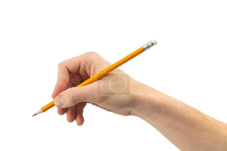 A hand poised to write with a classic yellow pencil isolated on white.