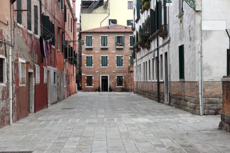 VENICE,ITALY - APRIL 26, 2019: An alleyway in Venice's Jewish ghetto. 