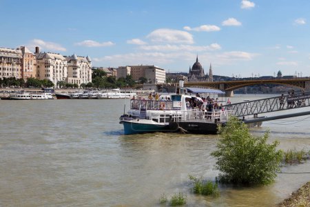 Photo for Budapest, Hungary - July 2, 2018: A boat for sightseeing is stationed at the Margaret Island in Budapest, Hungary. - Royalty Free Image