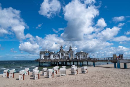 Photo for Sellin on Ruegen, Germany - July 16, 2022: Historic building at pier in the Baltic seaside resort of Sellin on the German island of Ruegen - Royalty Free Image