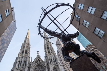 Photo for New York, USA, December 6, 2018: Atlas is a bronze statue in front of Rockefeller Center within the International Building's courtyard in Midtown Manhattan, New York City, USA - Royalty Free Image