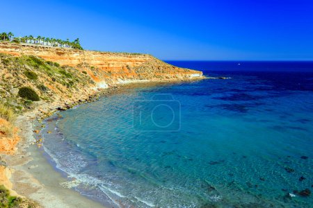 Foto de Summer landscape, sunny day at sea in Spain on the Mediterranean coast of Costa Blanca, Orihuela Costa, Cabo Roig - Imagen libre de derechos