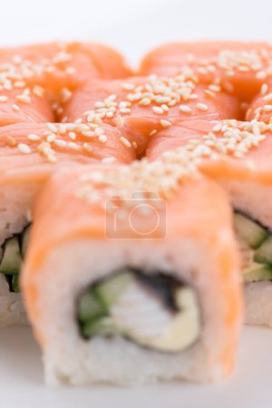 Photo for Sushi set and composition at white background. Japanese food restaurant, sushi maki gunkan roll plate or platter set. - Royalty Free Image