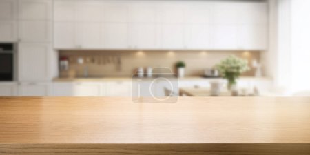 Foto de Tablero de madera marrón vacío para la exhibición del producto en fondo interior borroso blanco moderno de la cocina casera. banner con espacio de copia - Imagen libre de derechos