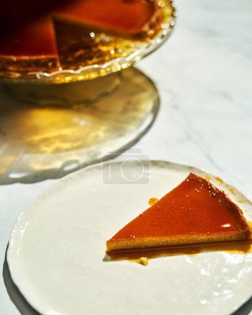 Thin Flan Mexicano - creamy, orange-scented custard with a golden syrupy topping of caramelized sugar. High quality photo