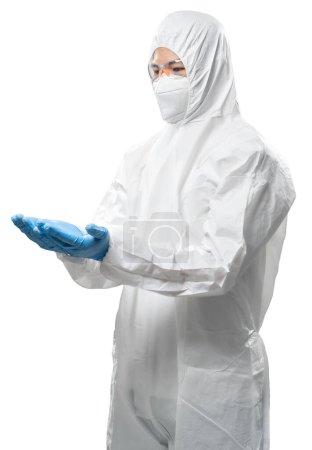 Foto de Worker wears medical protective suit or white coverall suit with mask and goggles hand extend isolated on white background - Imagen libre de derechos
