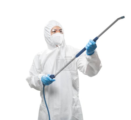 Foto de Worker wears medical protective suit or white coverall suit with mask , goggles and equipment for spray isolated on white background - Imagen libre de derechos