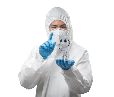 Photo for Worker wears medical protective suit or white coverall suit with small robot assistant in hand - Royalty Free Image