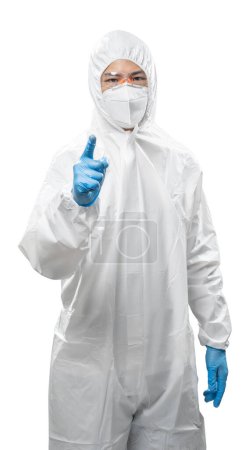 Téléchargez les photos : Worker wears medical protective suit or white coverall suit with mask and goggles finger point isolated on white background - en image libre de droit