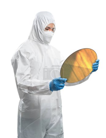Foto de Worker or engineer wears medical protective suit or white coverall suit with silicon wafer isolated on white - Imagen libre de derechos