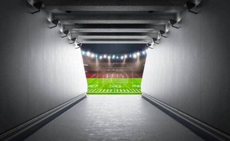 Téléchargez les photos : Tunnel dans le stade avec terrain de football américain - en image libre de droit