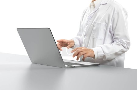 Photo for Doctor wear white lab coat work with laptop isolate on white background - Royalty Free Image