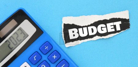 Photo for The word BUDGET on a small piece of paper. - Royalty Free Image
