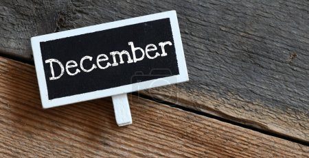 December on chalk board and table.-stock-photo