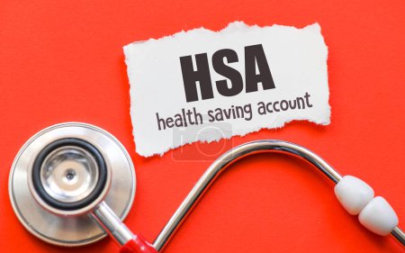 HSA health saving account words on a small piece of paper.