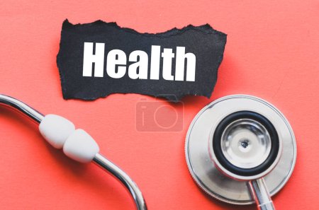Photo for Health word on a small piece of paper. - Royalty Free Image