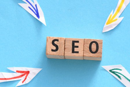 The word SEO made from scratch letters on a blue background