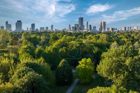 Aerial, drone panorama of Warsaw city during sunset. View from Pole Mokotowskie Park