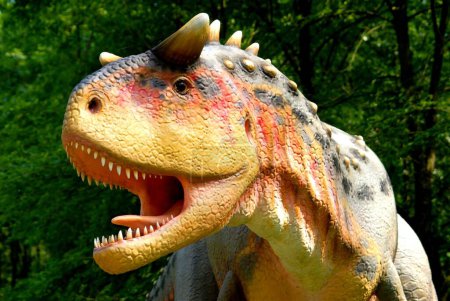 Photo for Dinosaur Carnotaur, Carnotaurus sastrei in jurassic park - Royalty Free Image