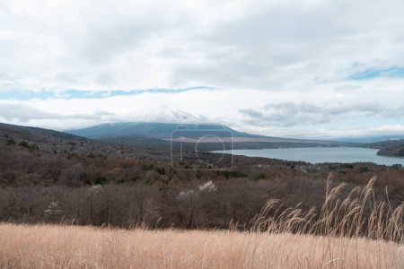 Photo for Yamanaka lake and Mt. Fuji seen from Panoramadai view point on cloudy day - Royalty Free Image