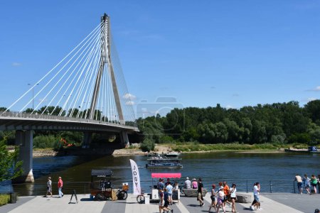WARSAW, POLAND - JUL 3: Swietokrzyski Bridge over the Vistula River in Warsaw, Poland, as seen on July 3, 2022.