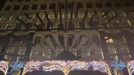 Photo for NEW YORK, NY - DEC 2: Holiday Light Show at Saks Fifth Avenue flagship store in New York City, as seen on Dec 2, 2022. - Royalty Free Image