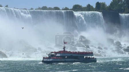 Photo for NIAGARA FALLS ON - MAY 27: Hornblower Niagara Cruises tourist boat at Niagara Falls, Ontario, in Canada, as seen on May 27, 2023. - Royalty Free Image