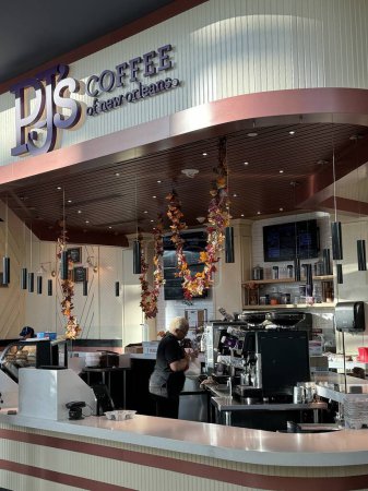 Photo for NEW ORLEANS, LA - NOV 21: PJs Coffee of New Orleans at MSY Louis Armstrong New Orleans International Airport in Louisiana, as seen on Nov 21, 2023. - Royalty Free Image