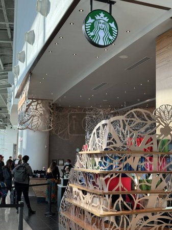 Photo for NEW ORLEANS, LA - NOV 21: Starbucks at MSY Louis Armstrong New Orleans International Airport in Louisiana, as seen on Nov 21, 2023. - Royalty Free Image