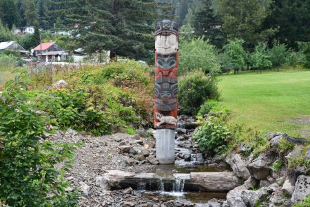 Photo for HOONAH, ALASKA - AUG 24: Totem Pole in the village of Hoonah at Icy Strait Point in Alaska, USA, as seen on Aug 24, 2023. - Royalty Free Image