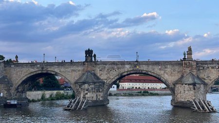 PRAGUE, CZECH REPUBLIC - JUL 8: Charles Bridge on the Vltava River, in Prague, Czech Republic, as seen on July 8, 2022.