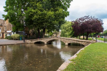 Photo for The village and stream of Bourton on the Water in the Cotswolds - Royalty Free Image