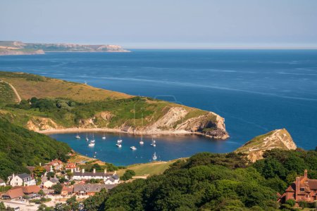 Photo for Lulworth Cove is a cove near the village of West Lulworth, on the Jurassic Coast in Dorset, southern England - Royalty Free Image