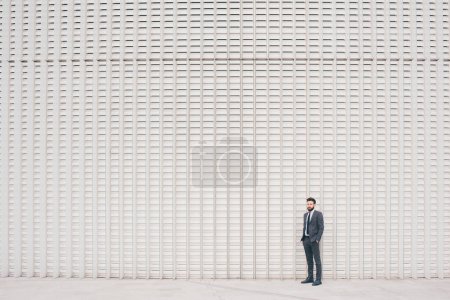Photo for Confident and professional elegant bearded businessman standing outdoor posing contemplating - Royalty Free Image