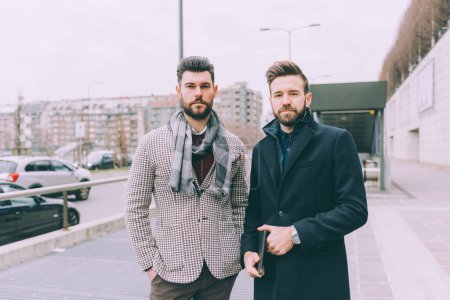 Photo for Two young bearded business men outdoor posing - Royalty Free Image