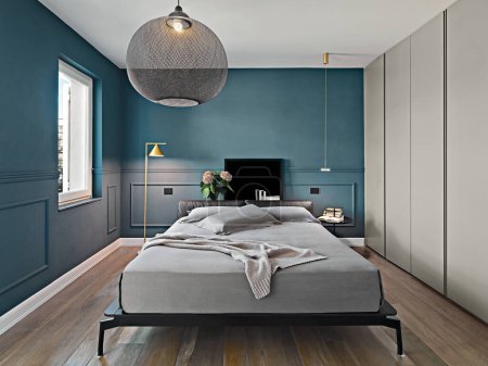 Photo for Modern bedroom  interior in the foreground  the bed the floor is made in parquet floor - Royalty Free Image