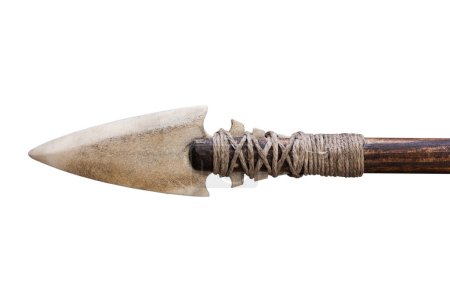 Arrowhead made of bone on arrow isolated on white background.