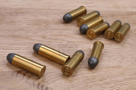 Old west ammunition on wooden table