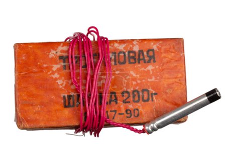 TNT block 200 gram. russian or soviet type isolated on white background. Inscription in russian on the photo: "TNT block 200 grams" and manufacturing date.