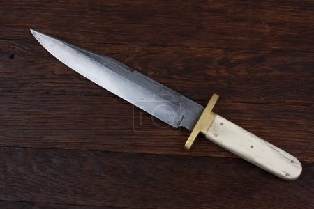 Old West Bobby Messer auf Holzdeck Hintergrund