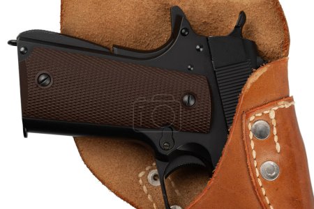 Automatic Pistol, Caliber .45 in holster isolated on white background