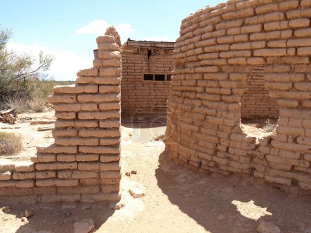 Photo for The ghostly remains of an old adobe brick home near Aztec Arizona. This decaying building was probably built before Arizona became a State over 100 years ago. - Royalty Free Image