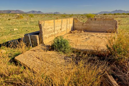 Photo for The remains of an old homestead within the flood plain of the Painted Rock Reservoir near Gila Bend Arizona. Because this is an abandoned homestead and is within the flood area of a reservoir no property release is necessary. - Royalty Free Image